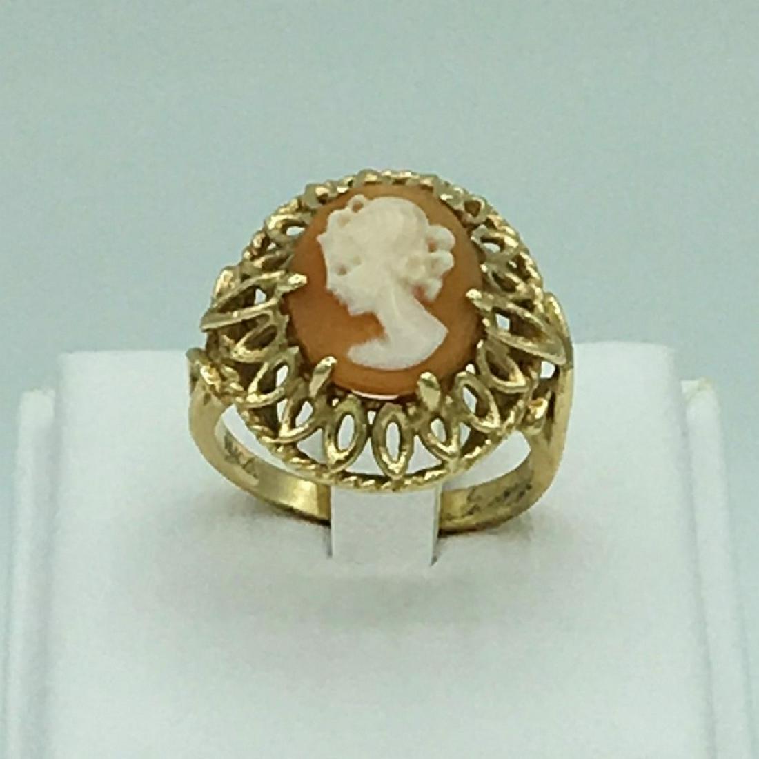 14K Yellow Gold Carved Shell Cameo Portrait Ring Size 6: 14K Yellow Gold Carved Shell Cameo Portrait Ring Size 6 1/2 Gram Weight 5.1. 3.3 dwt. Marked 14K See Photo. Shows Normal Wear See Photos.