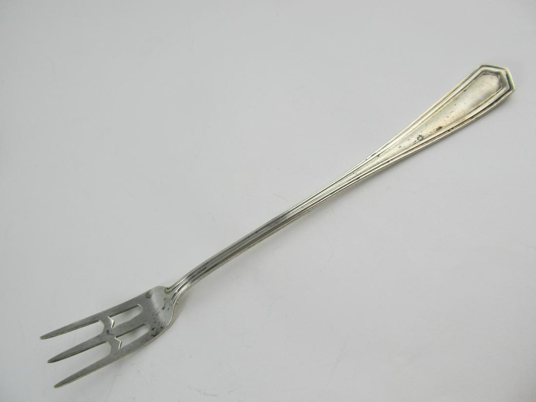 INTERNATIONAL SIMPSON HALL MILLER BRANDON STERLING: This nice early Brandon sterling pickle or olive fork is in excellent condition with some very light scratching. It has an older patina & will polish easily. It is just under 5 7/8 inches long. It wei