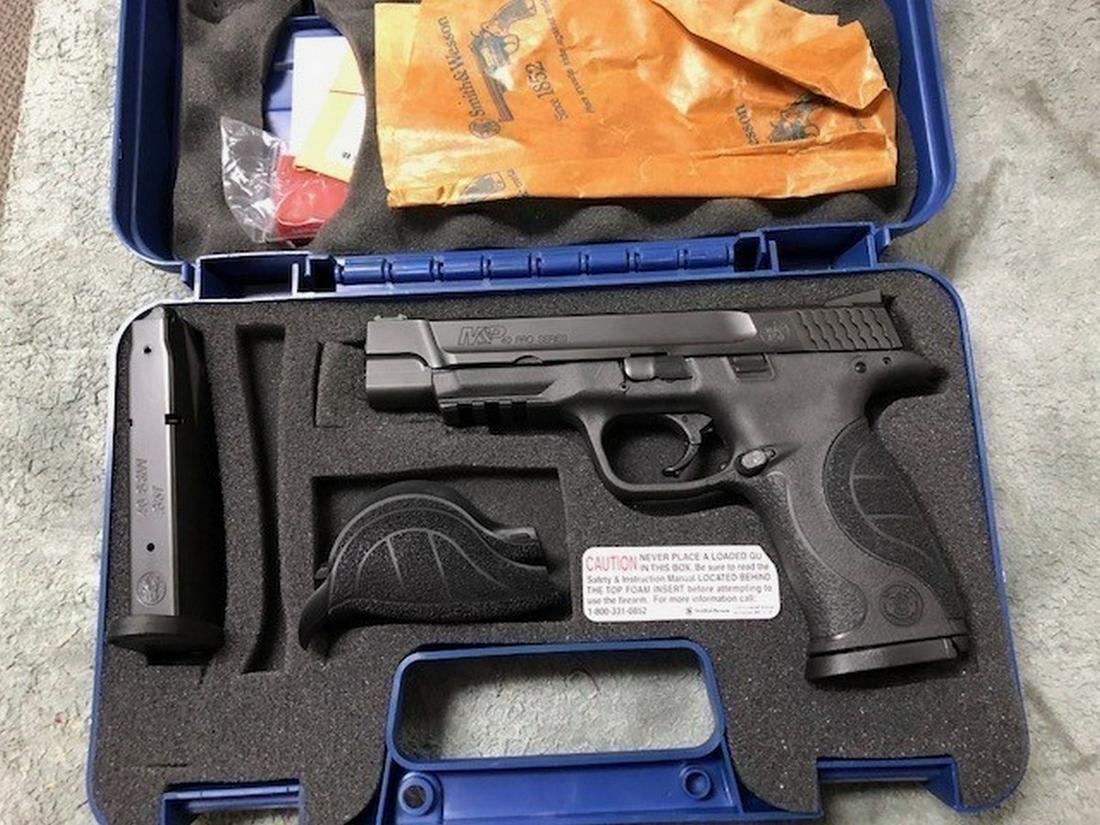 Smith & Wesson M&P40 Pro Series: This is a Smith & Wesson Pistol, Model M&P 40 Pro, .40 S&W Caliber, 5" Barrel, 2 MAGS, black finish, polymer grips, , CASE, Factory New. Please ask about questions or more pictures before bidding and