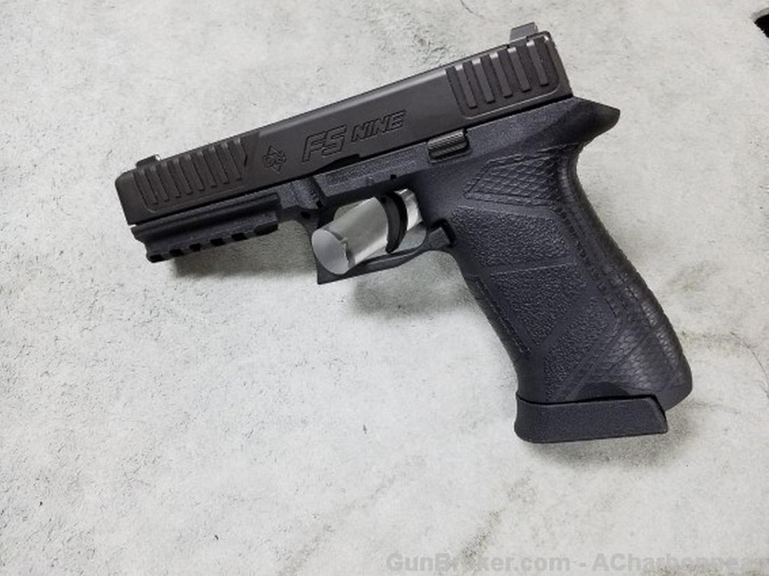 DiamondBack FS Nine: This is a DiamondBack Pistol, Model FS Nine, chambered in 9x19mm, 4.5" barrel, single action, polymer frame, 15 rounds magazine, white dot sights. Please ask about questions or more pictures before bi