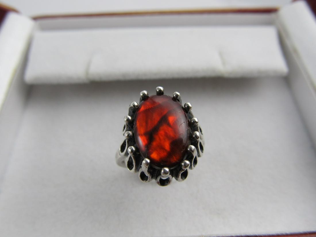 KABANA STERLING RING INSET OVAL RED ABALONE SIZE 6 3/4: This fine sterling ring features a nicely inset oval red abalone. It is in overall excellent condition with some slight scratching from being enjoyed. The sterling mark is stamped in the interior of t