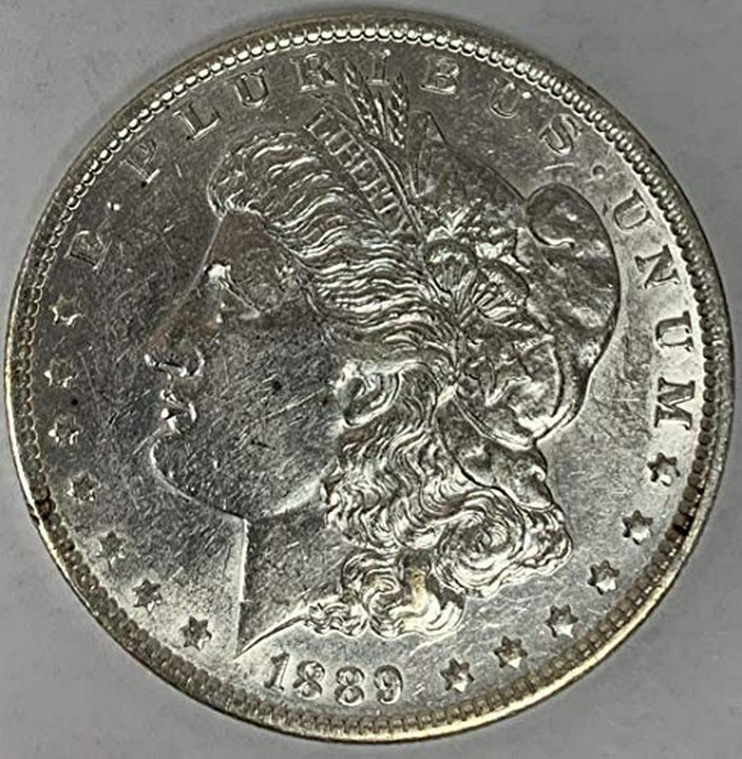 1889 O Morgan Silver Dollar $1 Slider AU/BU (1 of 1)