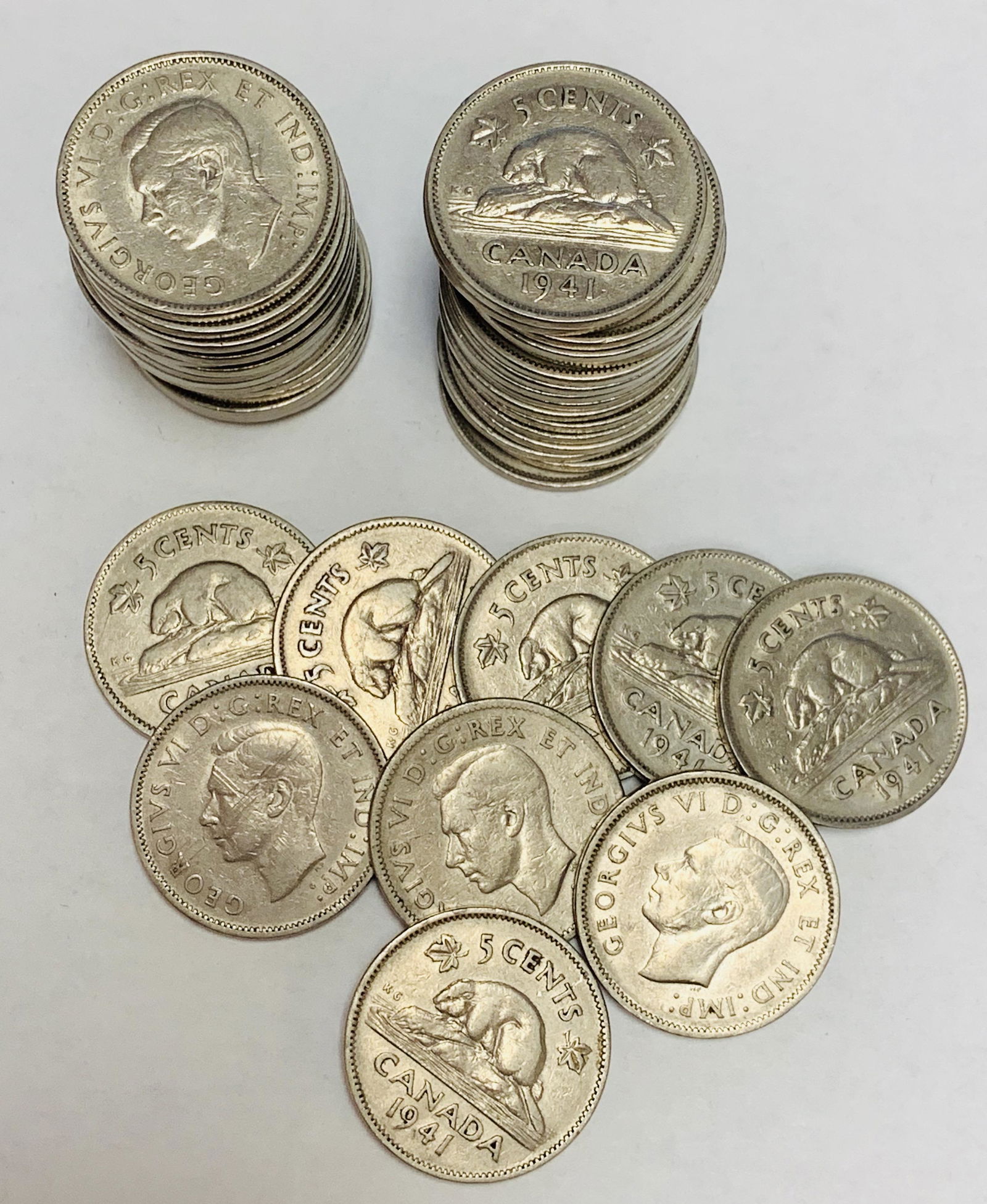 1941 Canada Nickels Roll of 40 coins various condition: 1941 Canada Nickels Roll of 40 coins various condition George VI 5c. Composition: Nickel; Weight: 4.5000g; Diameter: 21.2mm. Obverse: Head left; Obverse Designer: T. H. Paget; Reverse: Beaver on rock