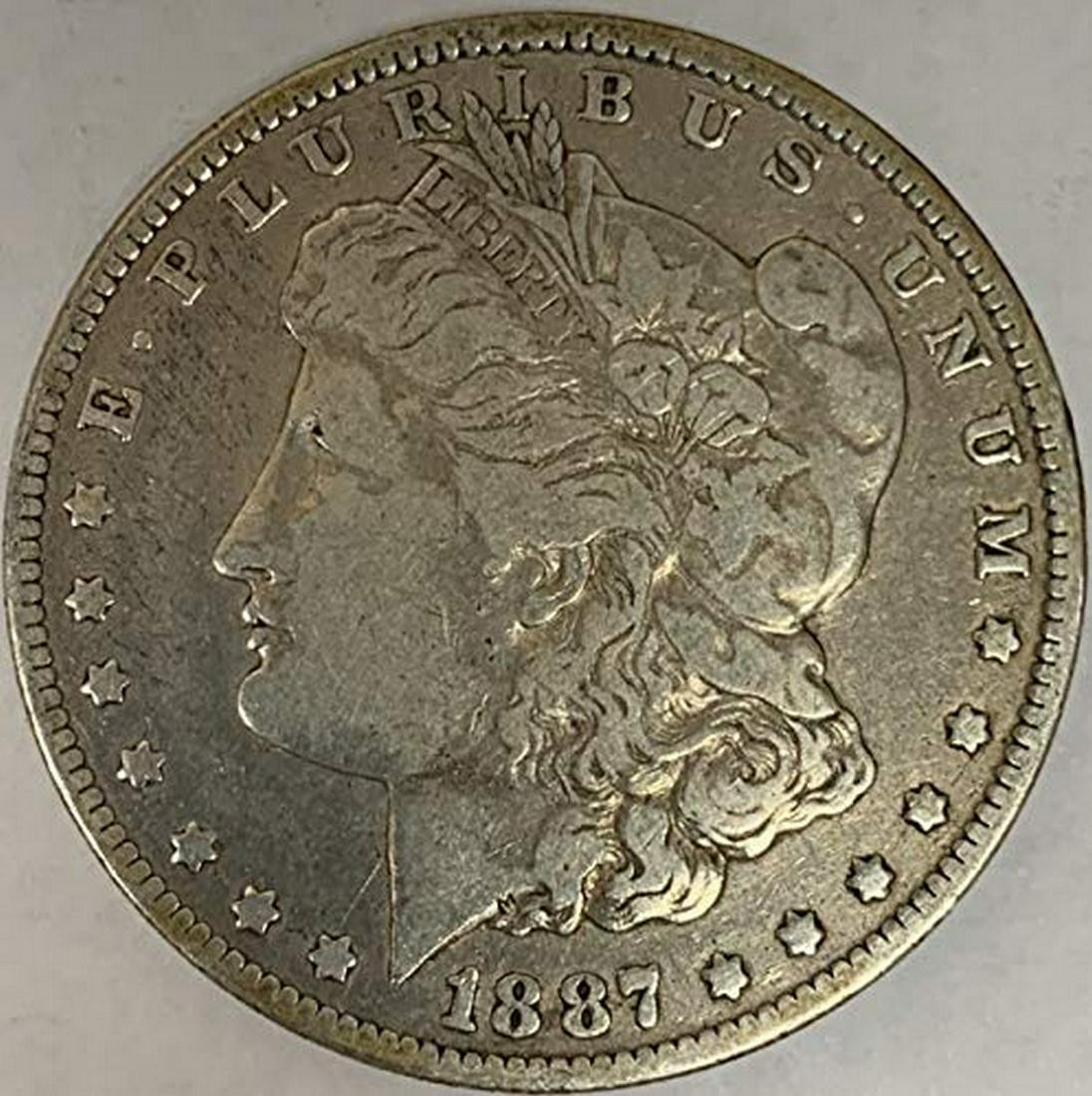 1887 O Morgan Silver Dollar Average Circulated $1 G-VG (1 of 1)