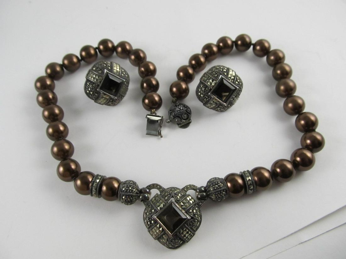MARCASITES STERLING SILVER NECKLACE OMEGA BACK PIERCED: This is a very wearable, attractive, sterling silver necklace & omega-back posted earrings set with fine inlaid marcasite & emerald cut citrines with synthetic brown beads. It is unclearly stamped wit