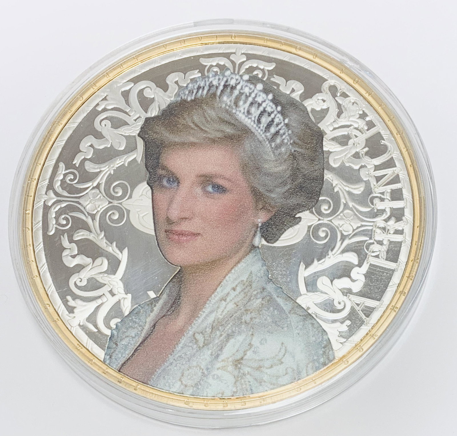 A Gigantic Silver-Plated and Gold-Accented Tribute to: A Gigantic Silver-Plated and Gold-Accented Tribute to Diana - Princess of Hearts - Diana - A Princess Jumbo Commemorative Coin - American Mint. Plated in .999 Pure Silver Accented in 24K Gold . Diamet