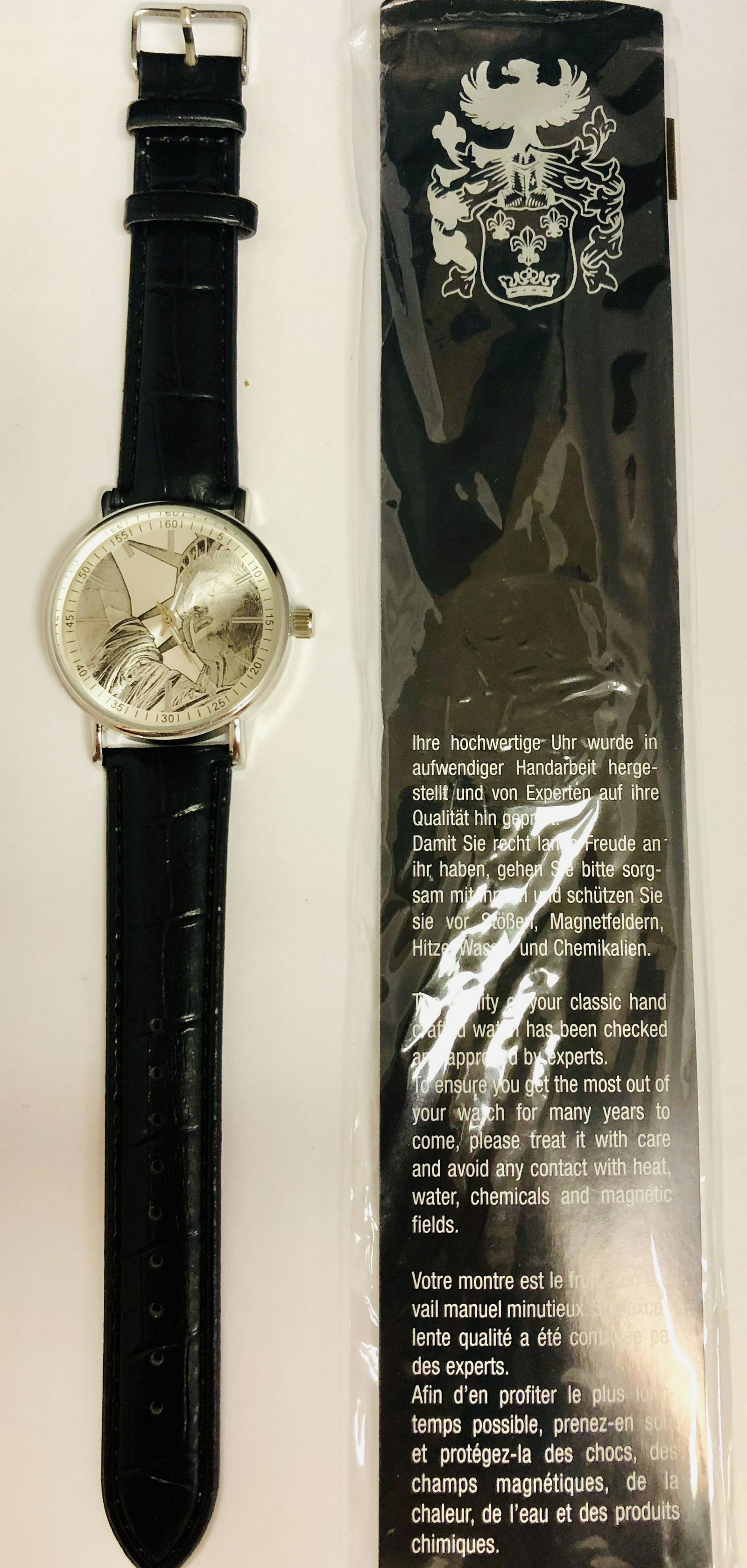 Mens 42 mm Eiger Statue of Liberty Quartz Wrist Watch: Mens 42 mm Eiger Statue of liberty quartz wrist watch with a black faux leather band.