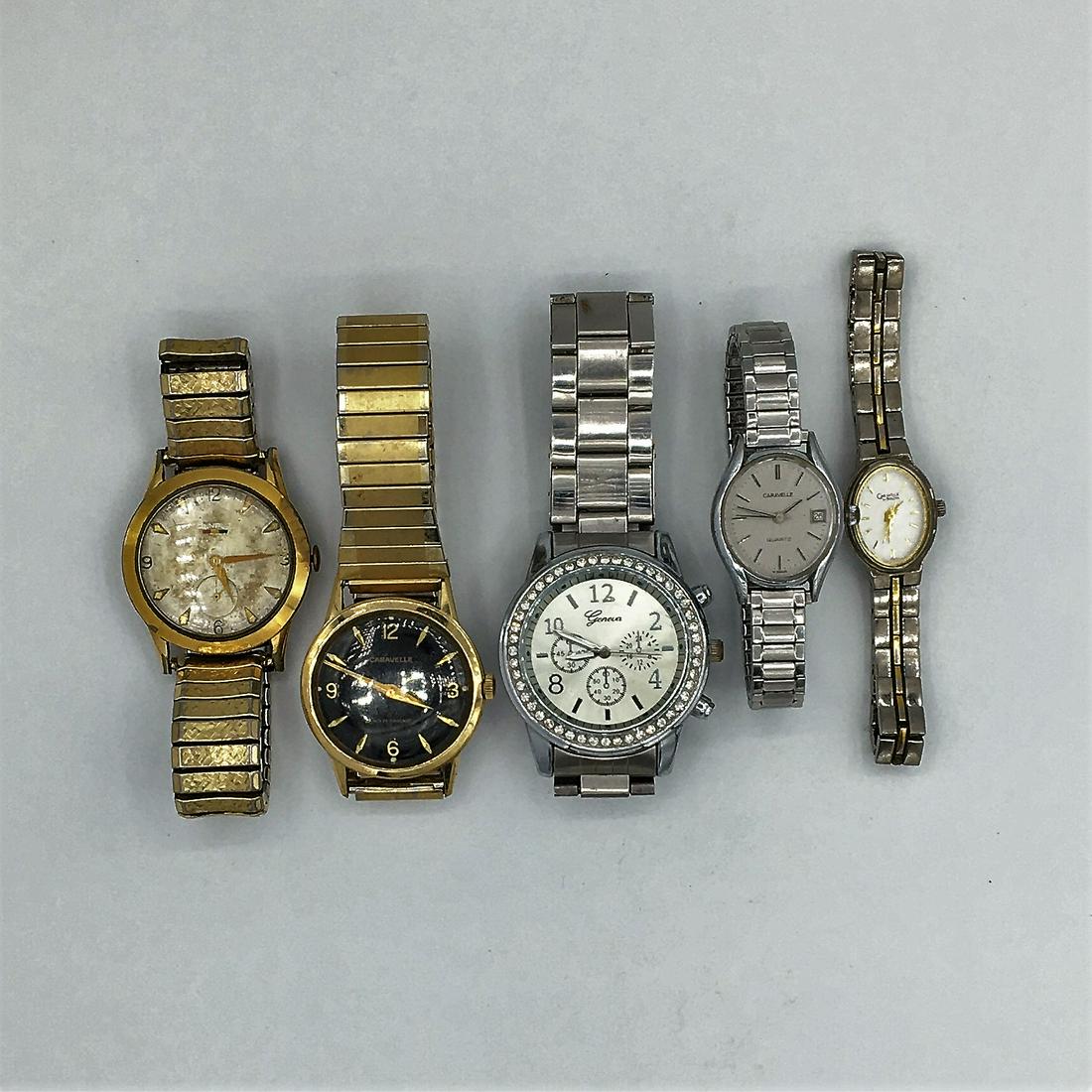 Group of Five Vintage Mixed Mens and Ladies Stainless: Group of Five Vintage Mixed Mens and Ladies Stainless Steel Wristwatches. Brands Are: Benrus, Caravelle (2), Geneva, Bulova.