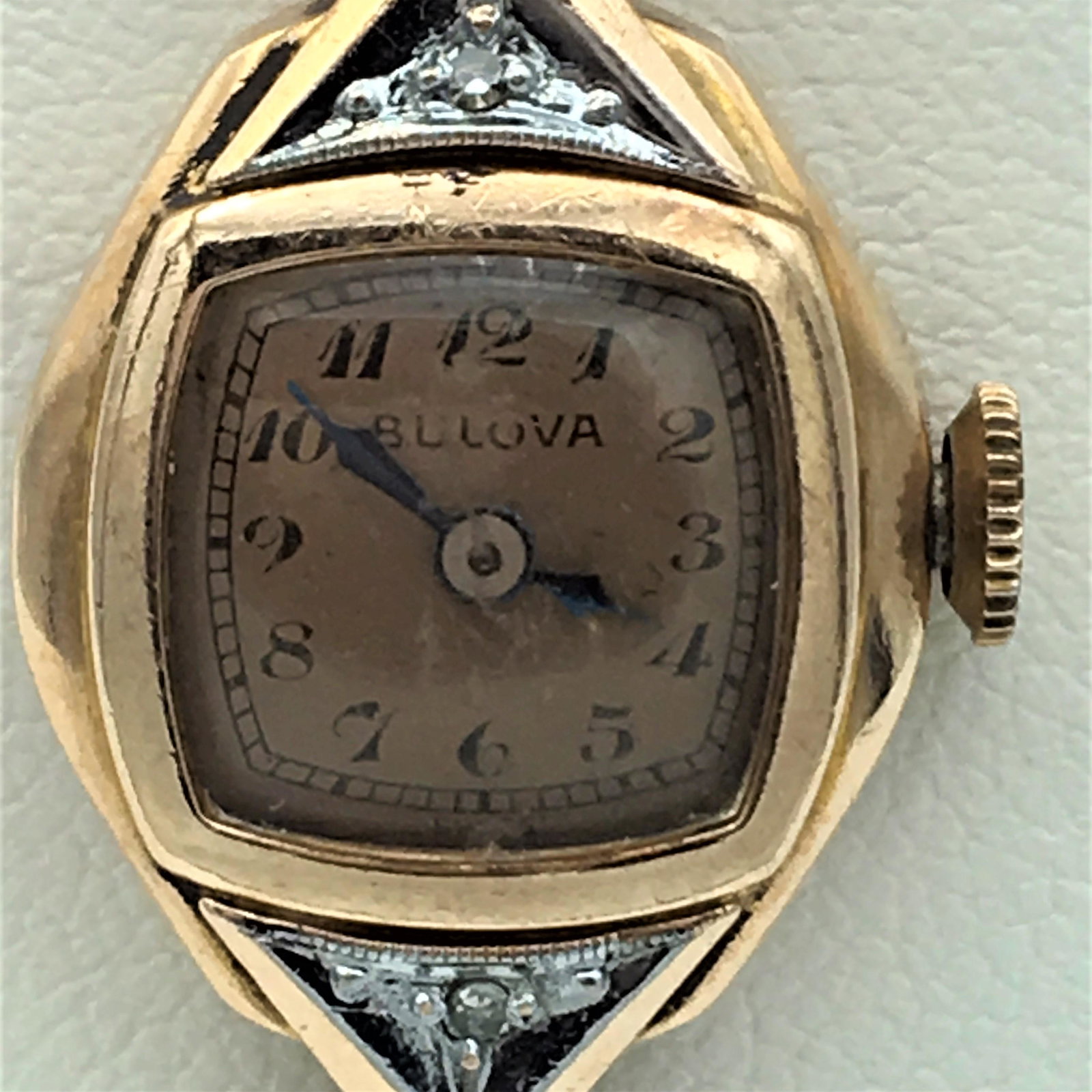 Vintage Bulova Swiss 14K GF and Diamond 17J Unadj 6 AH: Vintage Bulova Swiss 14K GF and Diamond 17J Unadj 6 AH Ladies Dress Wrist Watch. Measures 20 x 16 mm. Forstner 1/20-12K Gold Filled Metal Band. Watch is in Very Good Condition with Normal Age Associat