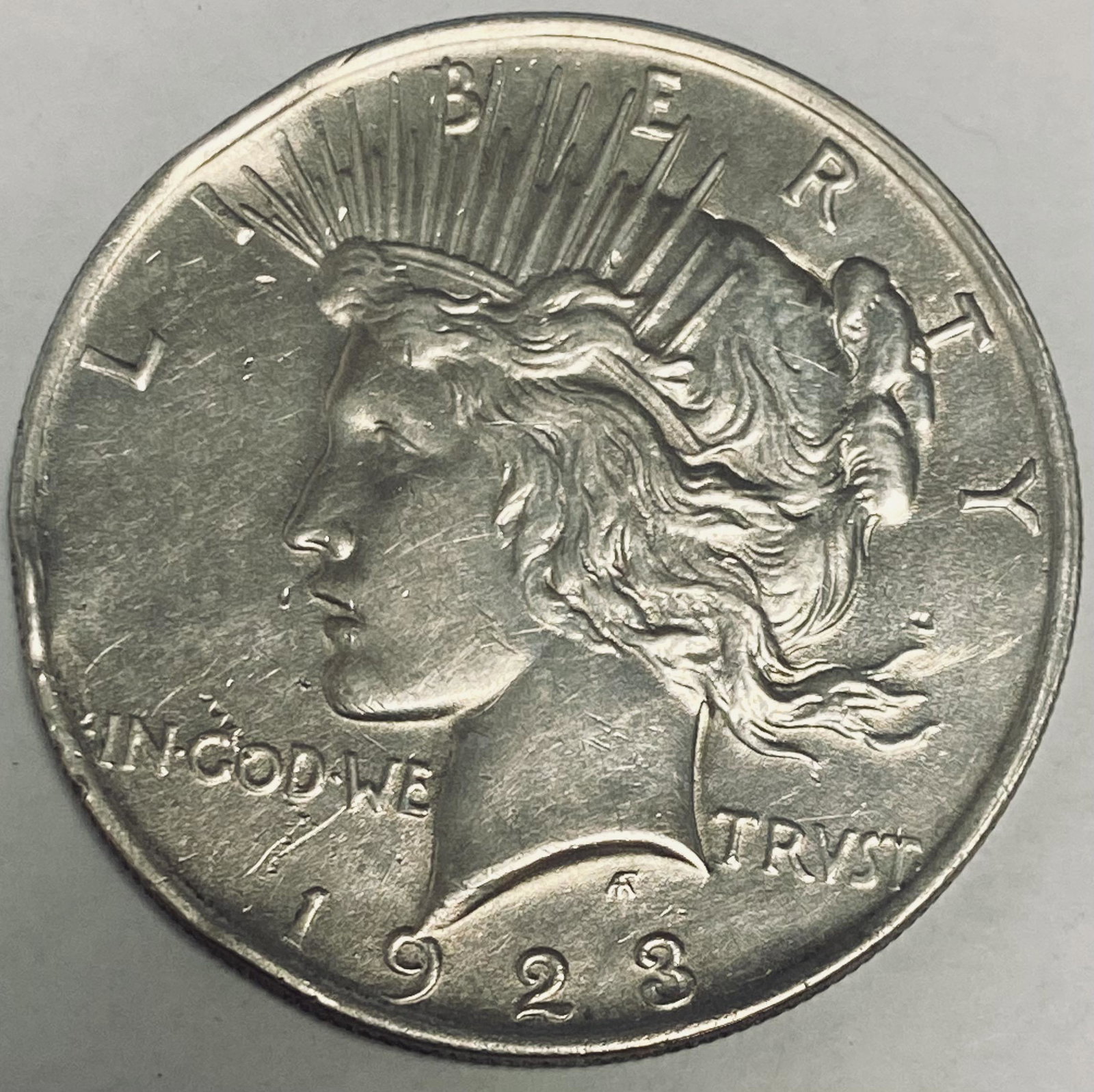 1923-P $1 Peace Silver Dollar Damaged (1 of 2)