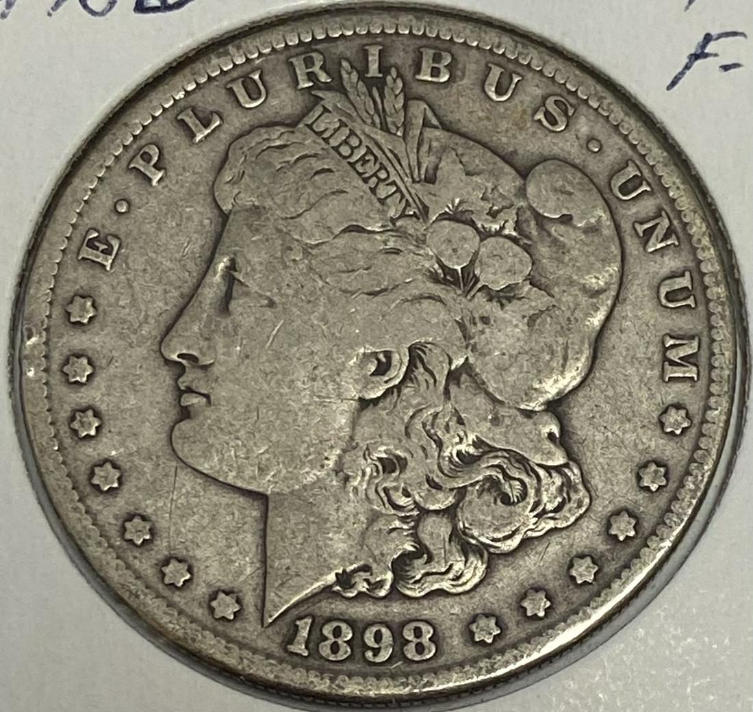 1899 S Morgan Silver Dollar Average Circulated $1 F-VF (1 of 2)