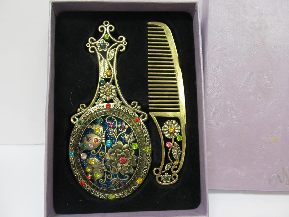 YING HAN INSET STONES SET COMB MIRROR 5 1/8" H FITTED: This possibly unused Ying Han comb & mirror set with inlaid multicolor synthetic stones is overall excellent condition in the original gift box. The comb is about 4 ¾ inches long & the mirror a