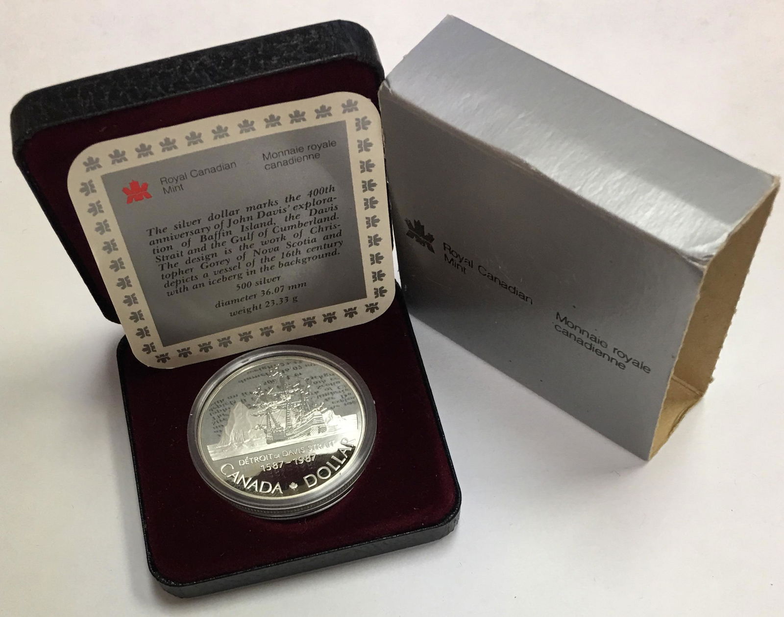 1987 Canada Silver Dollar, 400th Anniversary of John: 1987 Canada Silver Dollar, 400th Anniversary of John Davis\\' Exploration in Original Box. This $1 silver coin is 0.500 silver 0.375 oz. ASW with a weight of 23.33 grams and a diameter of 36 mm.