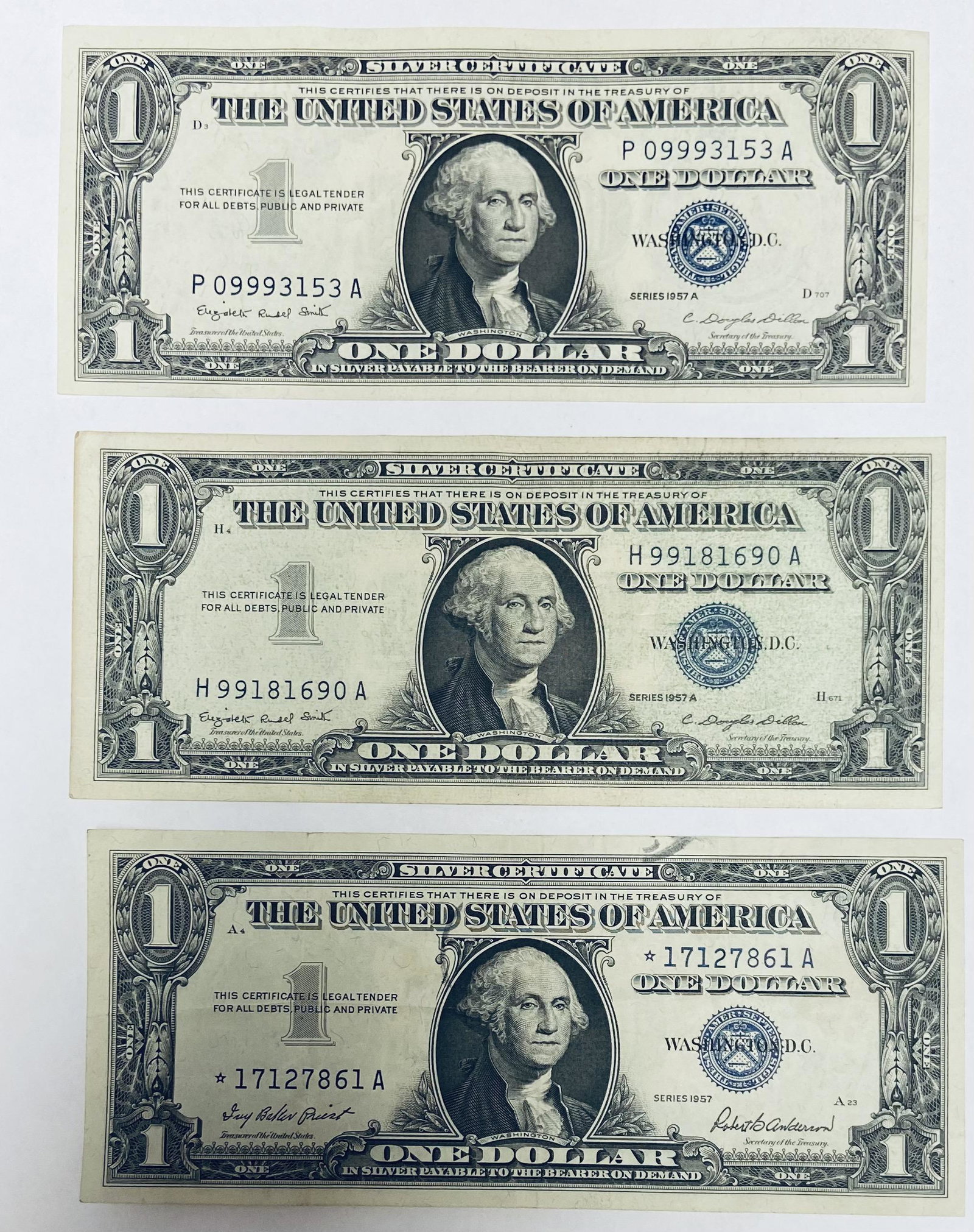 Lot of 3 - 1957 $1 Silver Certificates including Star (1 of 2)
