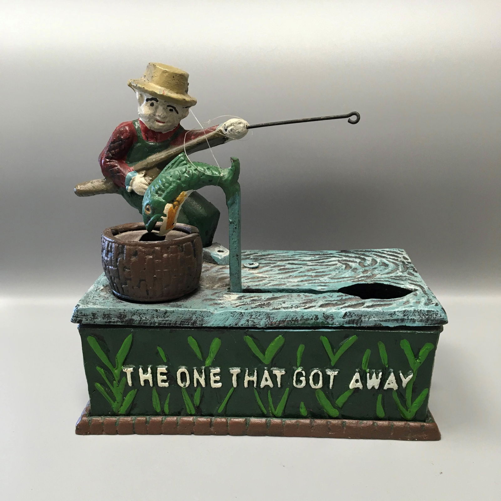 Vintage "The One That Got Away" Cast Iron Bank (1 of 3)