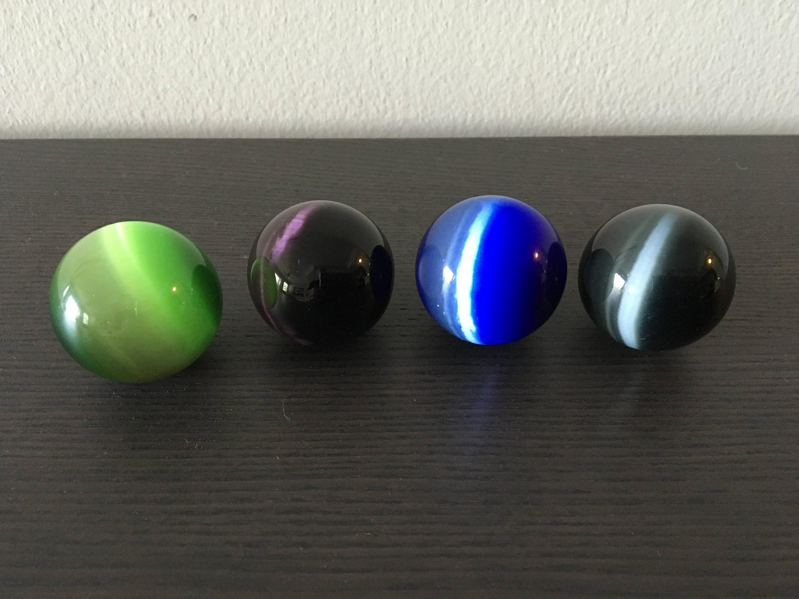 Four Glass Cat\'s Eye Large Marbles: Four Glass Cat\'s Eye Large Marbles, 1 1/2 Inch in Diameter.