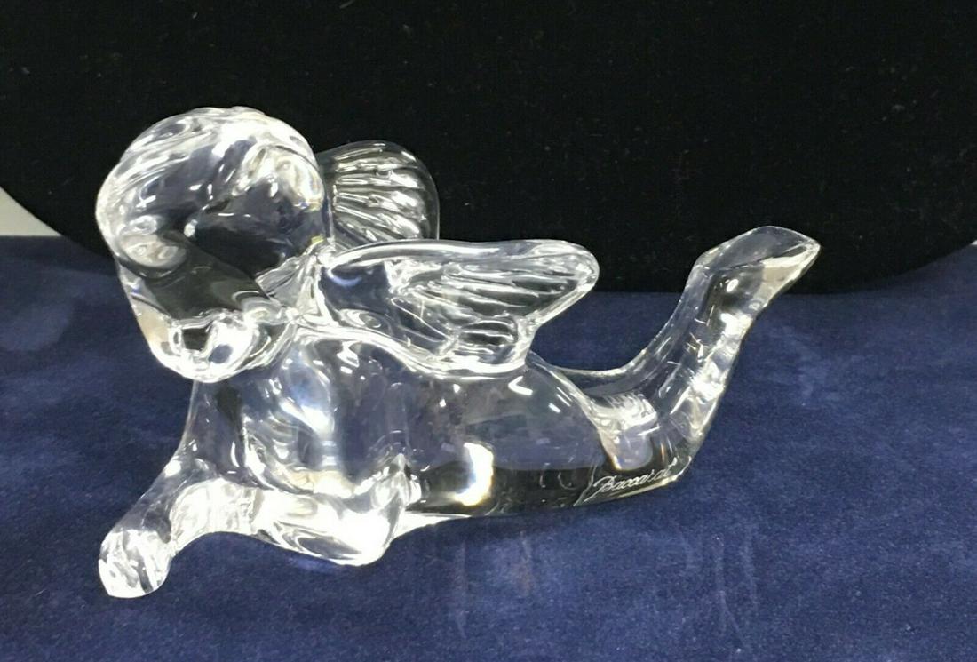 Baccarat Cherub Angel Laying Down Crystal Signed Figurine: Baccarat Cherub Angel Laying Down Crystal Signed Figurine.This nice figurine is in overall excellent condition with no wear or damages seen. The stamp and name are engraves on the bottom of this figur