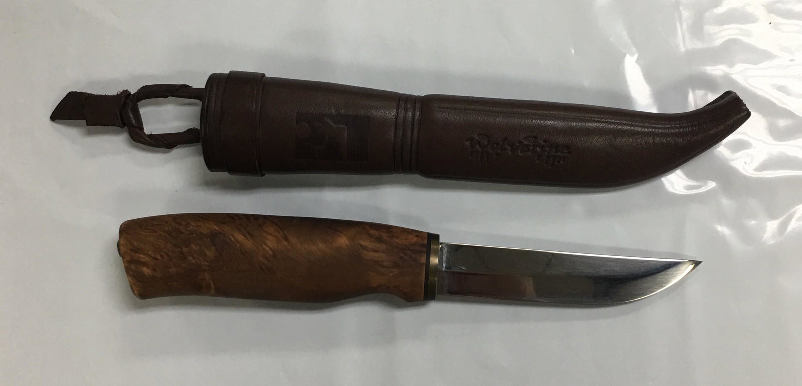 Kellam Wolverine Fixed Stainless Steel Blade Knife with Sheath 8": This knife is in excellent condition without any visible flaws. The blade of this knife seems to have never been used or sharpened. It comes with Wolverine leather sheath which is in excellent conditi