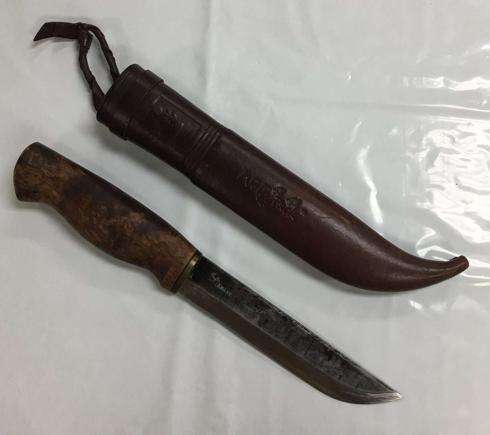 Kellam Wolverine Fixed Carbon Steel Blade Knife with Sheath 10.5": This knife is in very good con of wear like light scratches on the blade as shown in the photos. It comes with Wolverine leather sheath which is in excellent condition. The knife measures about 10 1/2