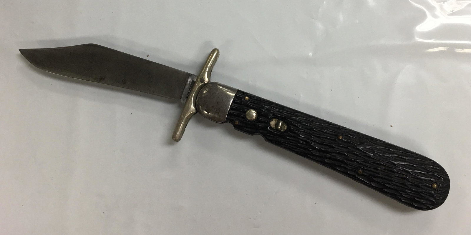 Vintage Schrade Walden WWII Paratrooper Automatic Knife: This knife is in very good condition with signs of wear like light scratches on the blade and metal part of the handle. It measures about 8 3/4" long with blade length about 3 1/2". Folded knife is ab
