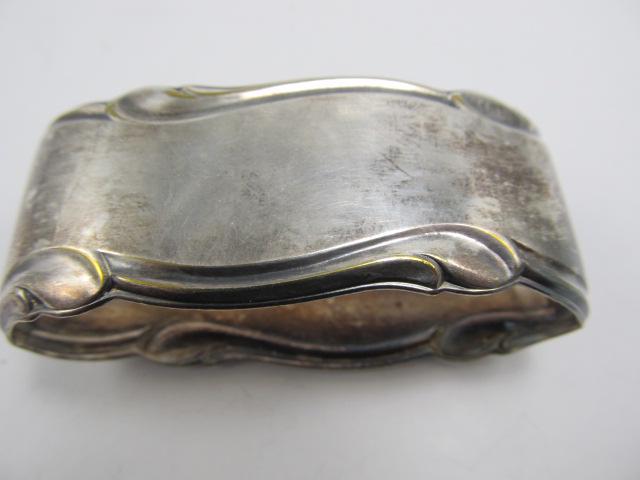 WMF GERMANY VINTAGE FINE NAPKIN RING XLNT COND FINE NAME: This very nice WMF Germany napkin ring is in overall excellent condition with almost no wear. It has an older patina & should clean & polish nicely.It is about 1 1/8 inches high sitting on its