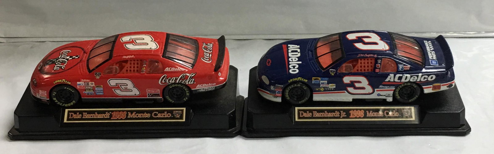 Set of 2 Hasbro 1998 Dale Earnhardt #3 & Dale Earnhardt Jr #3 1:43 Scale Racing Cars: These cars are in excellent condition with little signs of wear seen. They measure about 4 1/2" by 1 3/4" by 1 1/8". Please, review pictures for condition and details.