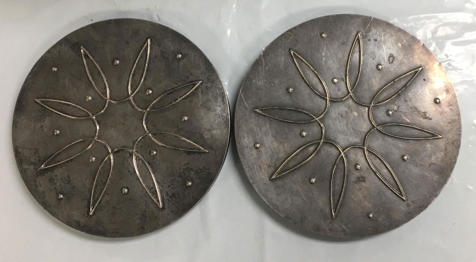 TOWLE AWAKENING 2 STERLING # 09 STANDS TRIVETS V GOOD COND NO MONO: They are in very good condition with no flaws seen other than some minor dents. The plastic under bases are in excellent condition. They appear to have had only moderate usage. They have an older pati