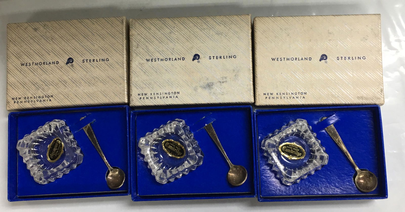 WESTMORLAND 4 SETS STERLING LADY HILTON SALT SPOONS CAMBRIDGE GLASS CELLARS BOXED UNUSED: These nice 4 Westmorland Lady Hilton sterling salt spoons come with Cambridge glass salt cellars unused in 4 original boxes. They are in overall excellent condition with no wear seen. The spoons have