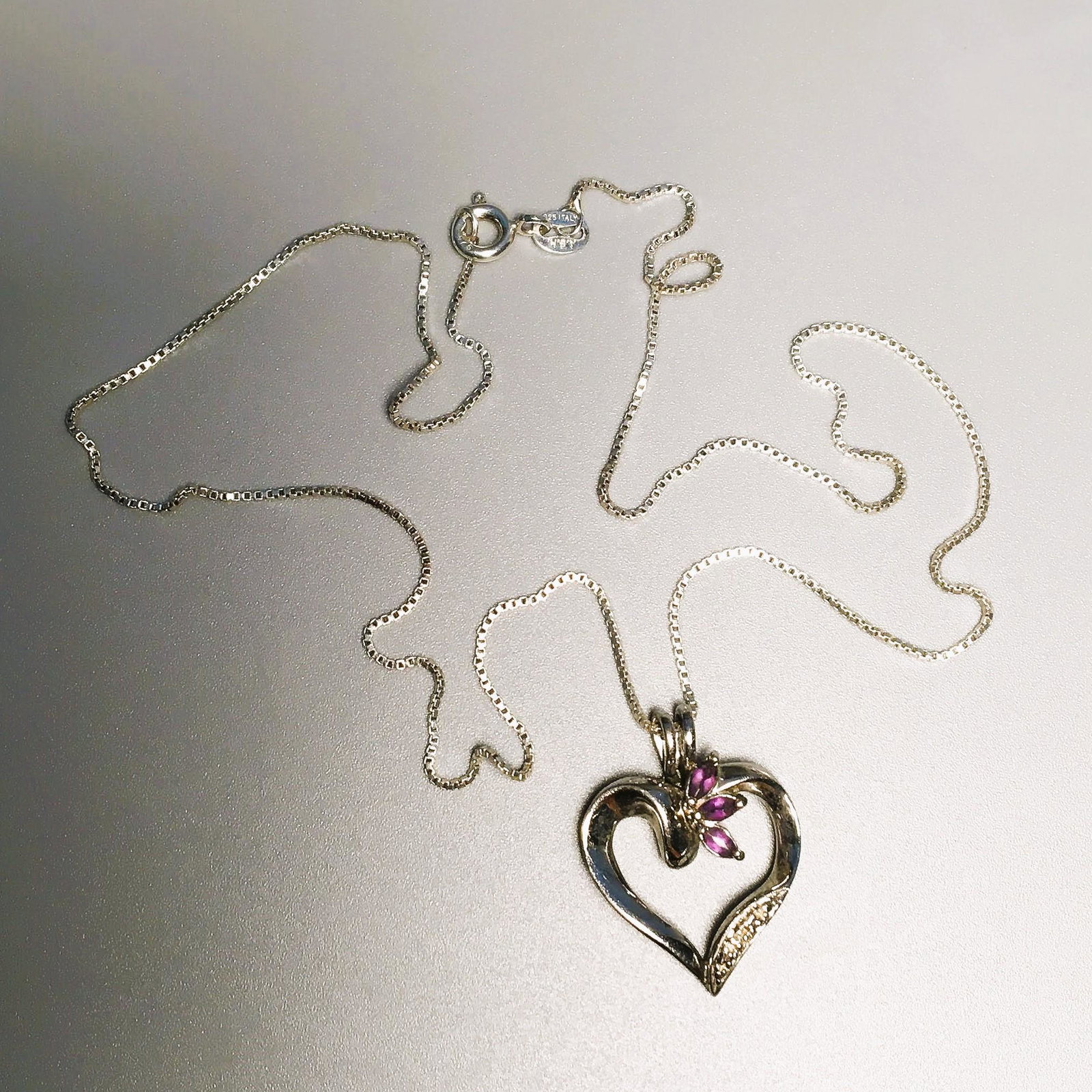 925 Silver & Amethyst Heart Pendant Necklace: 925 Silver & Amethyst Heart Pendant Necklace, Chain Marked 925 Italy, Pendant Marked 925 China, Measures 10 Inches, 2.8 dwt.