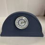 This fine Wedgwood dark blue desk or mantel clock with a German movementkept accurate time when