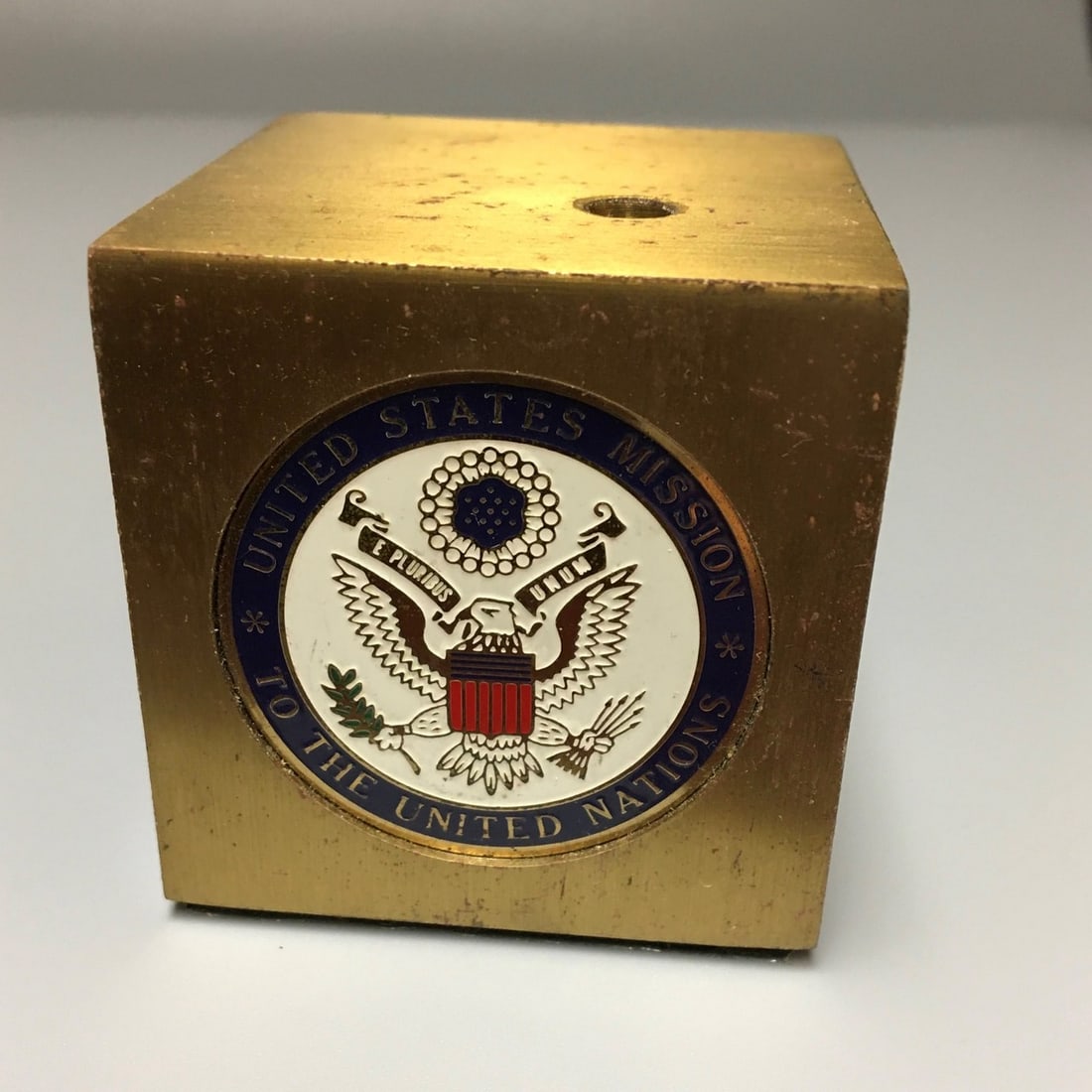 US Mission to the UN Metal Flag Holder: United States Mission to the United Nations Metal Flag Holder with Embossed Enamel Seal, 2 x 2 x 2 in.