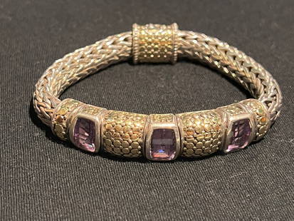 Sterling silver John Hardy classic chain bracelet with gold embellishments and purple stones: Sterling silver John Hardy classic chain bracelet with gold embellishments and purple stones. Pressure fit clasp closure. 47.6 dwt