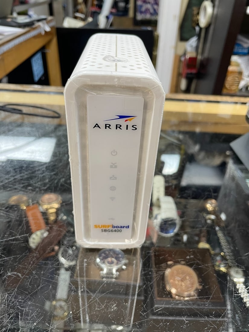 ARRIS SBG6400 DOCSIS 3.0 SURFboard Cable Modem WiFi Router Comcast Xfinity TWC: This ARRIS SBG6400 DOCSIS 3.0 SURFboard cable modem and WiFi router combination is the perfect solution for those looking to upgrade their home network. With compatibility with major cable internet pr