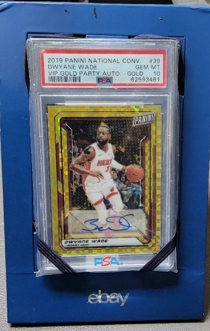 2019 Panini National Convention Dwyane Wade Vip Gold Autograph /5 Pop 1 PSA 10: The product is a 2019 Panini National Convention Dwyane Wade VIP Gold Autograph trading card, signed by Dwyane Wade himself. This rare card has a population of only 1, making it highly sought after