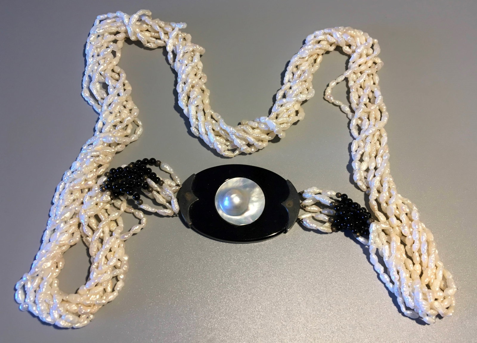 Freshwater Pearl Necklace with Sterling Silver Accents: Freshwater Pearl & Plastic Necklace with Sterling Silver Accents, Marked .925, 15 in. Long.