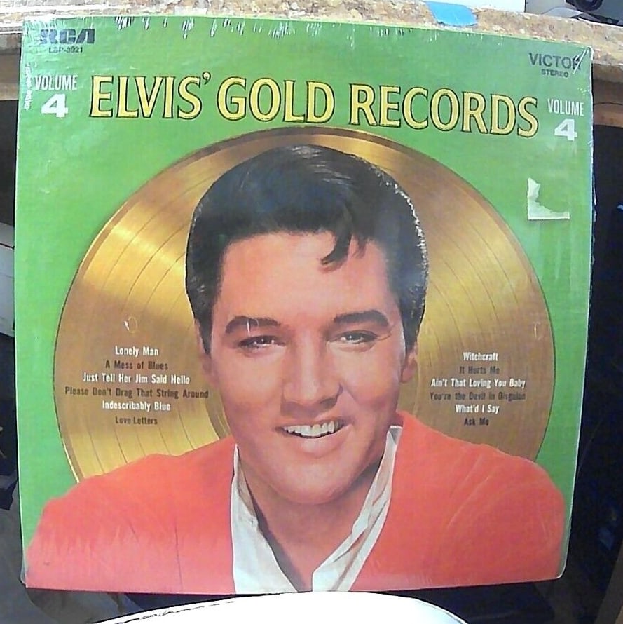 Elvis Presley - Gold Records Vol. 4 - 1976 US Press Tan Labels LSP-3921: Unopened! This is a fantastic album from Elvis Presley, featuring his greatest hits. The LP has a speed of 33 RPM and is a 12" record in a cardboard sleeve. The inlay and sleeve are both in mint condi