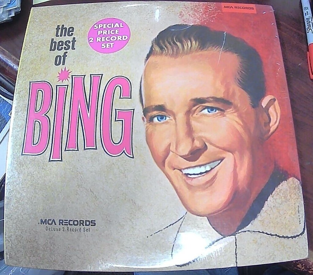 BING CROSBY - THE BEST OF BING - MCA2-4045 2 LP SET GATE FOLD COVER - "SEALED": This double LP set features the legendary Bing Crosby with his greatest hits, including pop classics like "White Christmas" and "Swinging on a Star." The vinyl is housed in a sturdy cardboard sleeve w