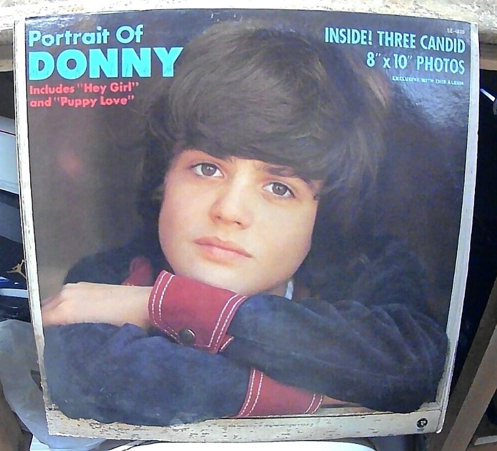 Donny Osmond Vinyl Lp "Portrait Of Donny", MGM Records 1972 SE 4820: This vinyl LP features Donny Osmond's iconic album "Portrait of Donny" released in 1972 under the label of Portrait and MGM Records. The first pressing of the album comes in a black vinyl material and