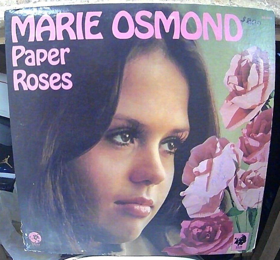 Marie Osmond Paper Roses MGM SE 4910 Records Vinyl LP Stereo Record: This vinyl record features the popular Marie Osmond with her album "Paper Roses". With a speed of 33 RPM and a record size of 12 inches, this LP has a traditional/vocal style and falls under the pop g