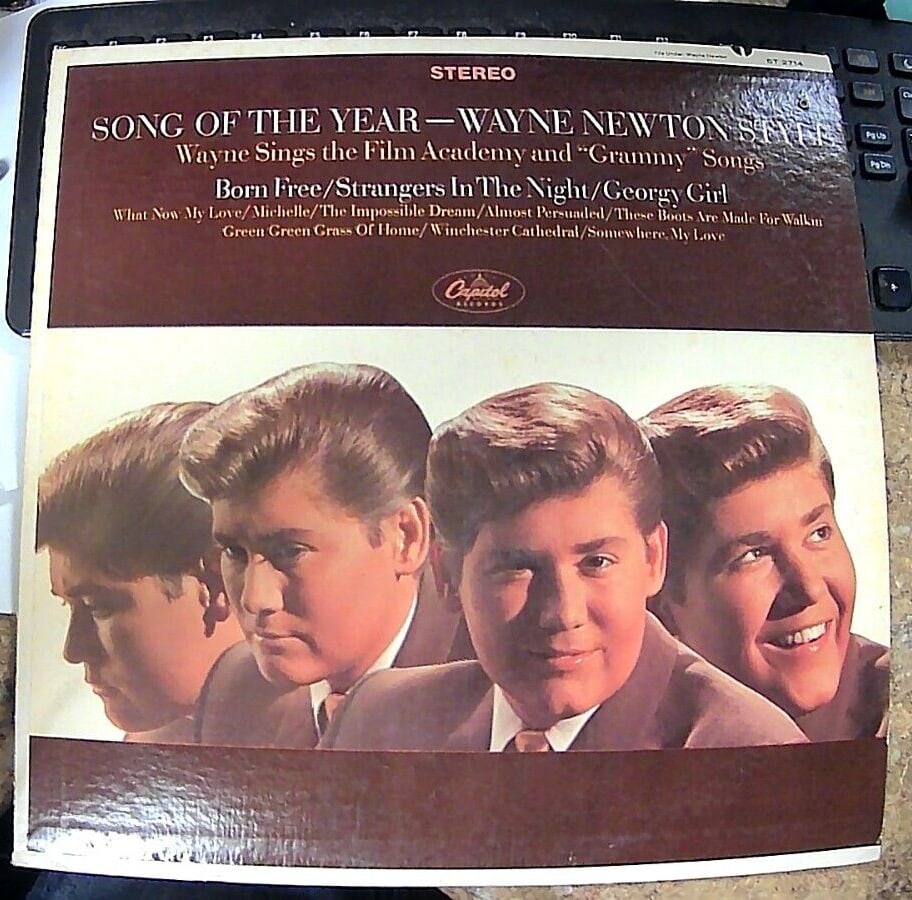Song of the Year - Wayne Newton Style - Record LP Stereo Capitol Records ST2714: This vinyl record is a must-have for any music lover! Featuring the talented Wayne Newton, this LP is sure to bring joy to your ears with its 33 RPM speed and stereo audio channels. The record, labele
