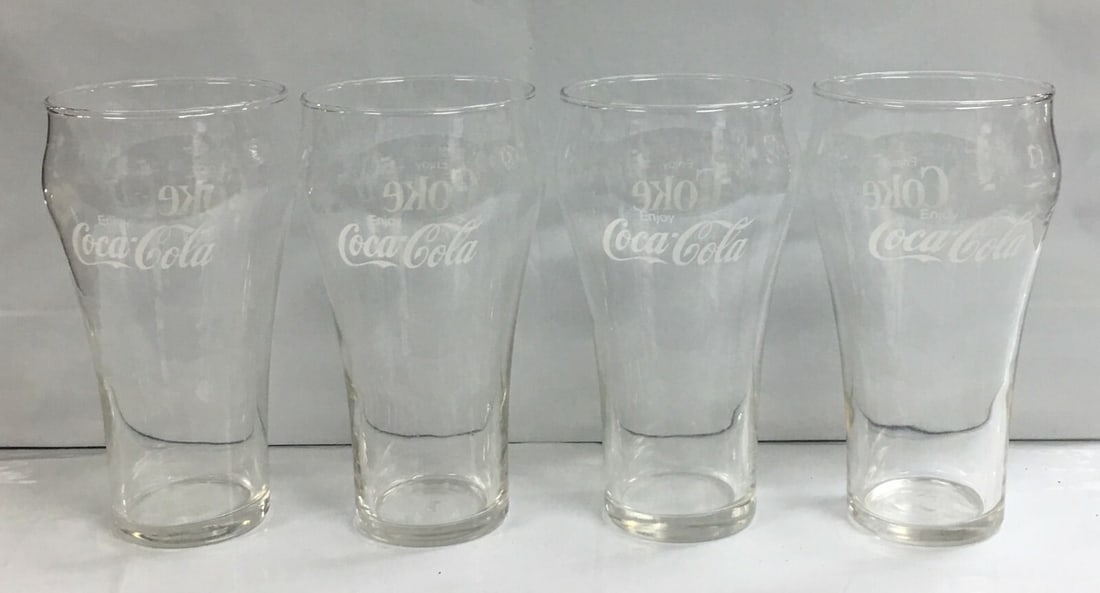 Set of 4 Vintage Enjoy Coca-Cola Coke Bell Shaped Drinking Glasses 6": These glasses are in outstanding condition with no nicks, chips, crazing or any other flaws seen. Please, review pictures for condition and details. This would be a great addition to your collection!