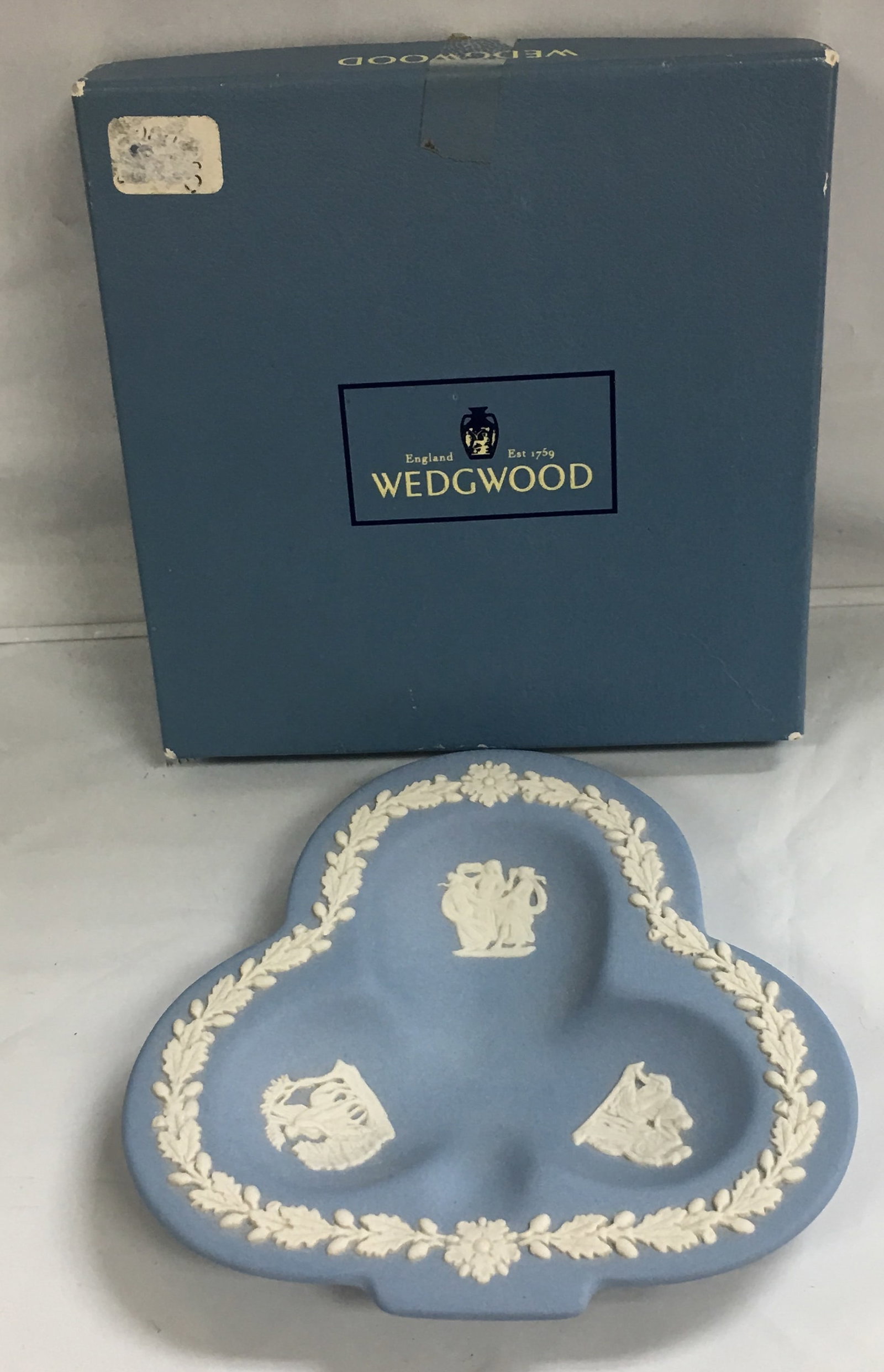 Wedgwood Jasperware White and Blue Trinket Plate Nut Dish in Box: This dish is in excellent condition without any visible flaws. It measures about 4 3/4" by 4 5/8 by 5/8". Please, review pictures for condition and details. This would be a great addition to your coll