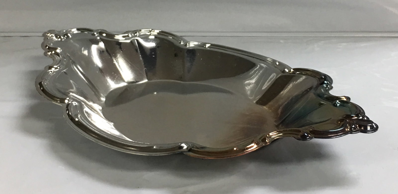 Vintage International Silver Co Silver Plated Candy Serving Oval Dish Bowl: This bowl is in excellent condition with almost no signs of wear seen. It has an older, unpolished patina and should polish nicely. There is no monogram or indication any monogram was removed. It meas