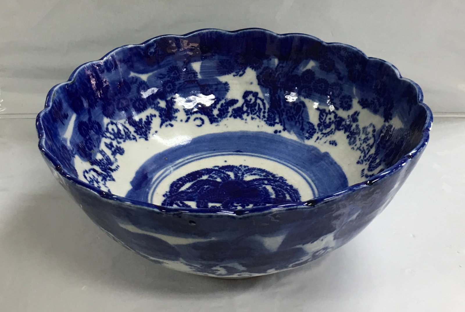 Vintage Chinese Porcelain Hand Painted Blue and White Footed Serving Bowl: This bowl is in very good condition with a little signs of wear seen. Closer to the base there is some defect in the production of this bowl, it is not a crack or a scratch as shown in the photo 11. I