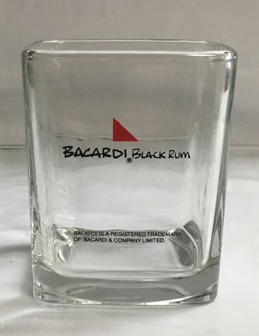 Vintage Bacardi Black Rum Rock Square Glass: This glass is in outstanding condition with no nicks, chips, crazing or any other flaws seen. It is about 3 1/2" tall and 3" wide at the top. This would be a great addition to your collection! Please,