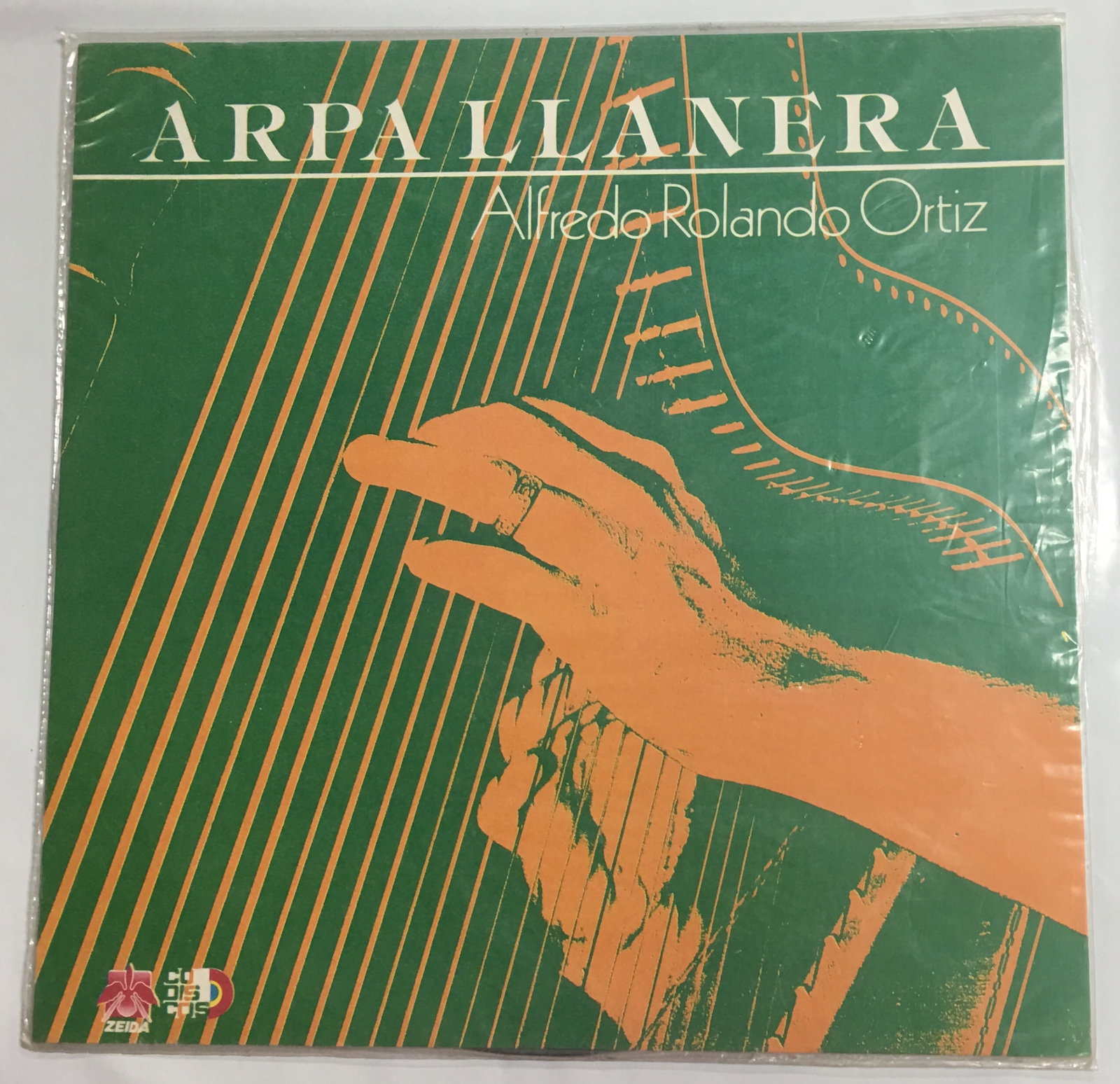 Alfredo Rolando Ortiz - Arpa Llanera Zeida - 29820997 Vinyl LP: Alfredo Rolando Ortiz - Arpa Llanera Zeida - 29820997 Vinyl LP Product Description: This record is in excellent condition with little signs of wear seen. The cardboard sleeve has some shelf wear like 