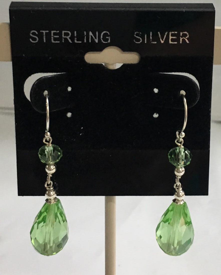 Elegant Sterling Silver and Dimond Cut Green Crystals Dangling Earrings 1 5/8": These earrings are new. They are marked 925. They are about 1 5/8 inches long together with the hook and 10 mm wide at the widest point with a weight of 2.80 dwt or 4.4 grams. Please, review pictures 