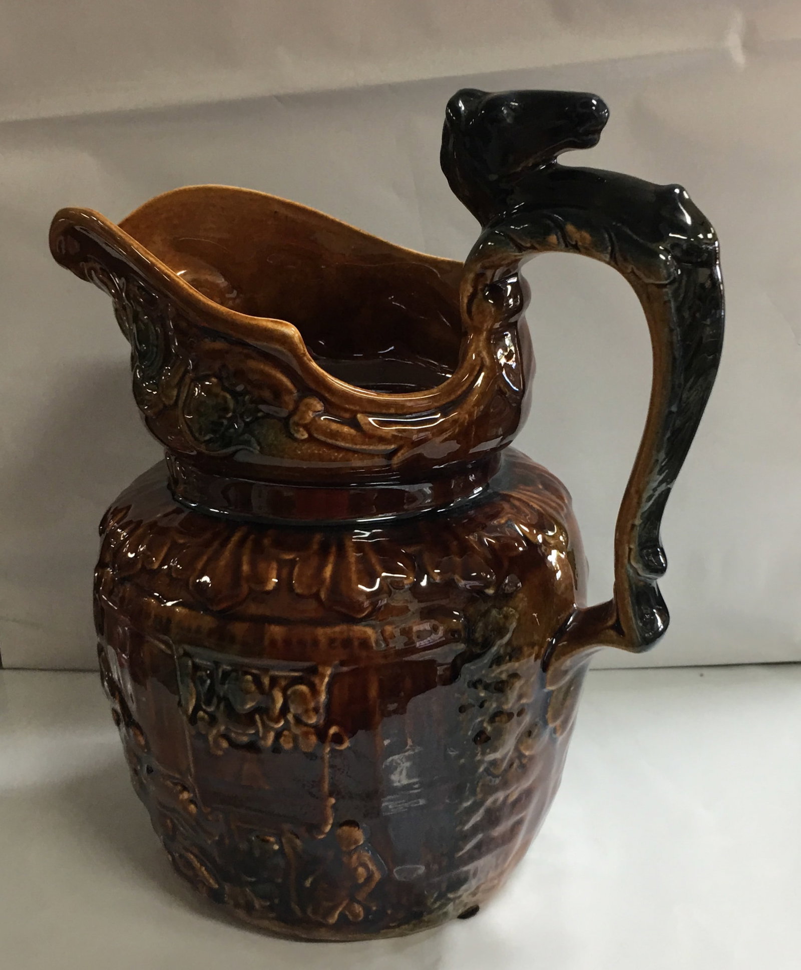 Vintage Arthur Wood English Pottery Brown Pitcher with Horse Head Handle: This pitcher is in excellent condition without any visible flaws. It is about 9 3/4" high from the bottom to the top of the handle and 6 1/4" wide at the widest point without handle. Please, review pi