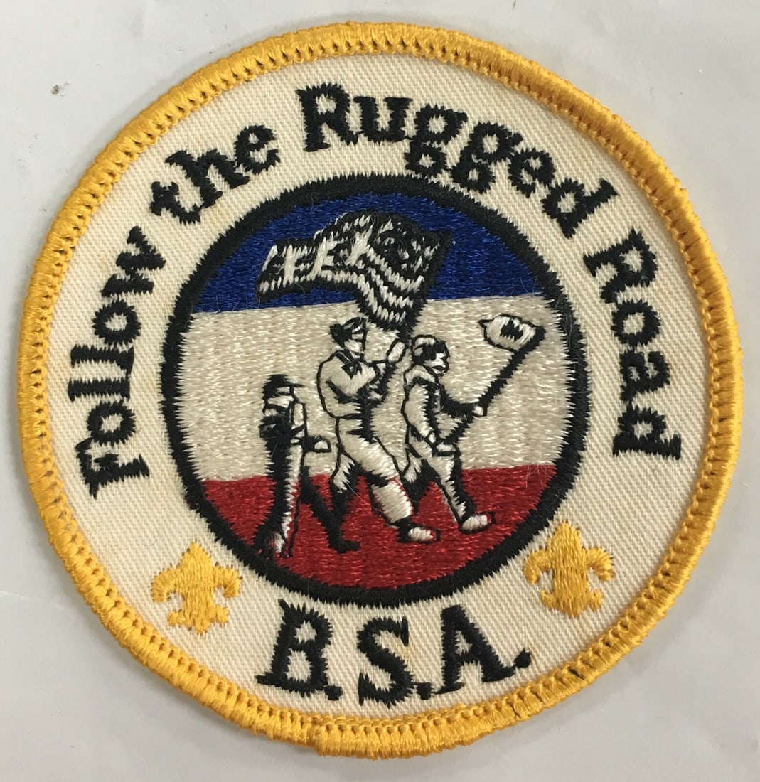 Boy Scout Follow the Rugged Road Embroidered B.S.A. Patch: Boy Scout Follow the Rugged Road Embroidered B.S.A. Patch. This patch is in excellent, like new condition. It measures about 3" in diameter. This would be a great addition to your collection! Please,