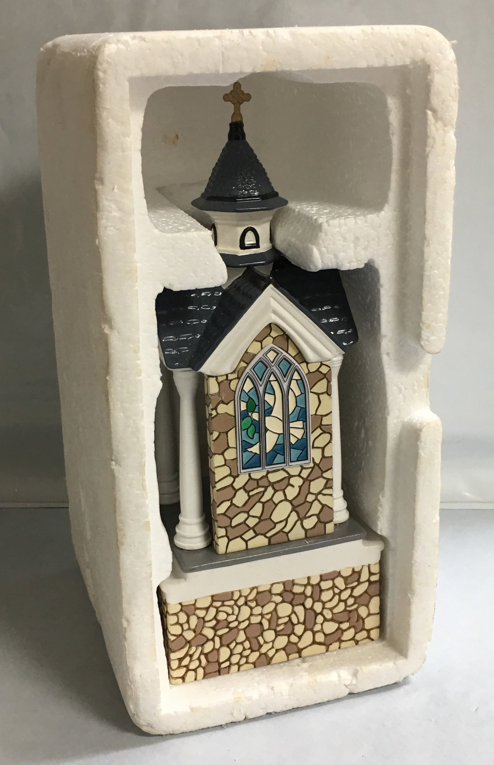 Department 56 Snow Village Holy Spirit Baptistery Music Box: This music box is in excellent condition without any visible flows. There is no box for it. It measures about 8 1/2" by 4 5/8" by 3 1/4". Please, review pictures for condition and details.